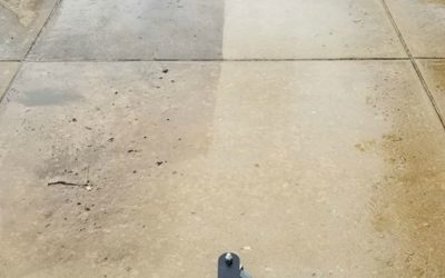 Pressure washing sidewalk to remove dirt and stains in Springfield, Missouri.